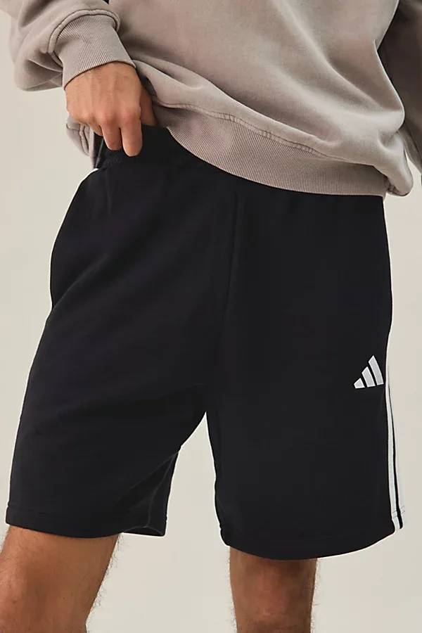 Essentials 3-Stripes Fleece Shorts by adidas