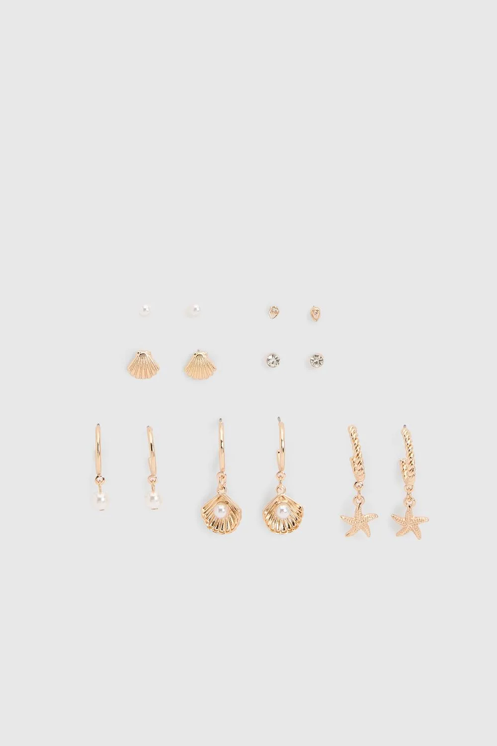 Ocean Detail Stacking Earrings 7 Pack by boohoo
