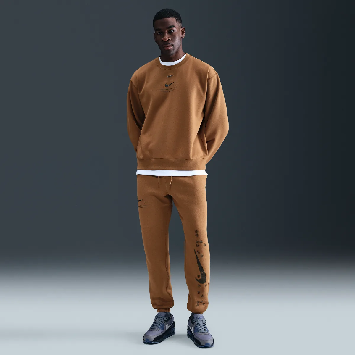Sportswear Club Cuffed Fleece Pants by Nike
