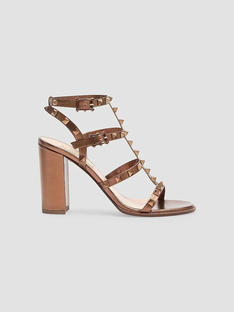 Rockstud Metallic 90MM Calfskin Leather Ankle Strap Sandals by Valentino