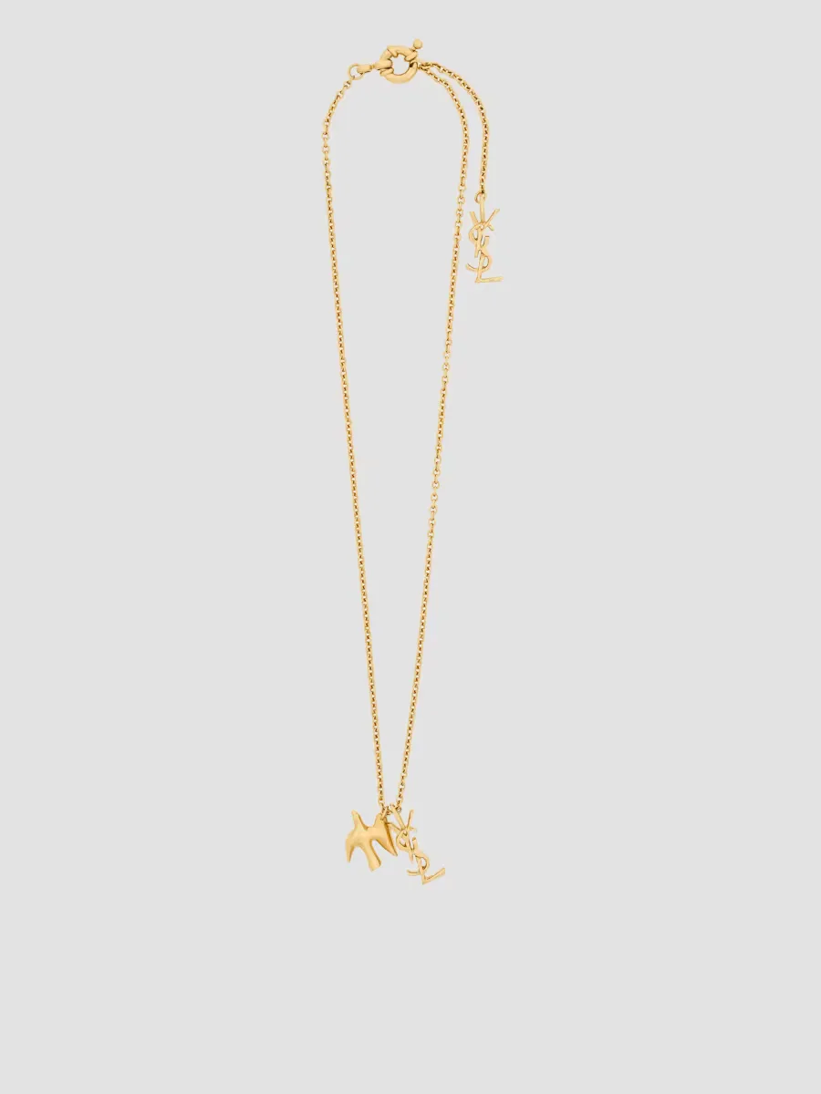 Cassandre Dove Necklace in Brass by Saint Laurent
