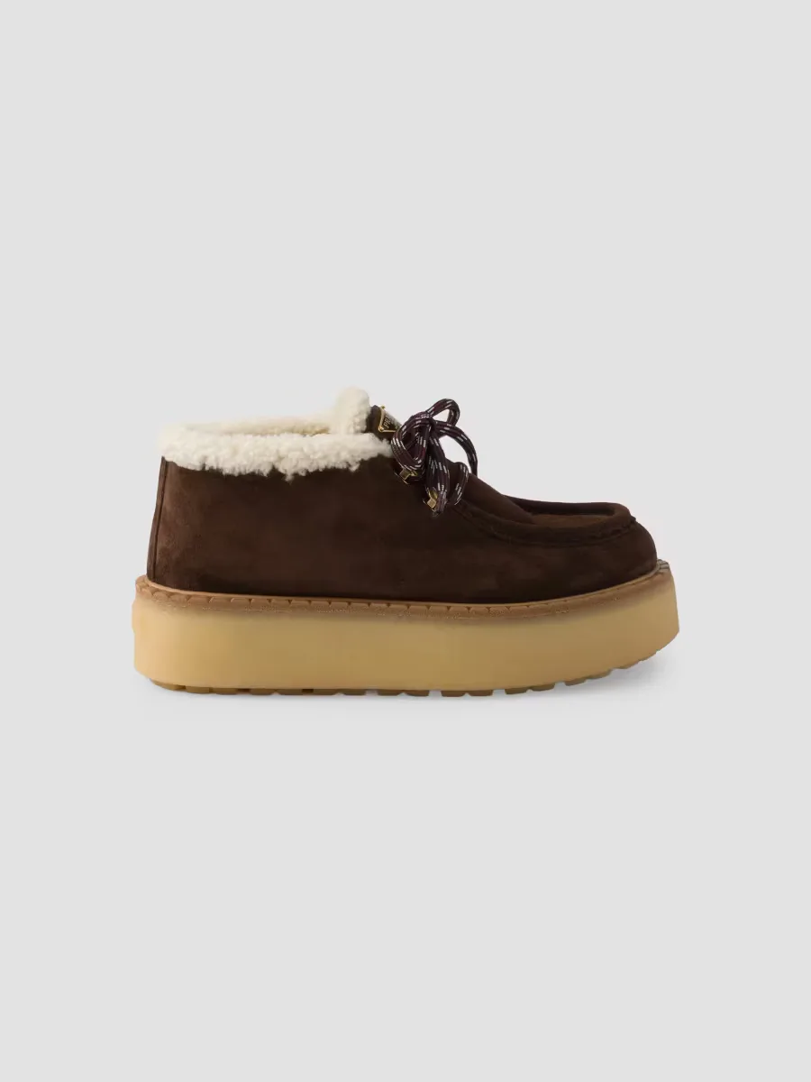 Shearling Lined Suede Booties by Prada