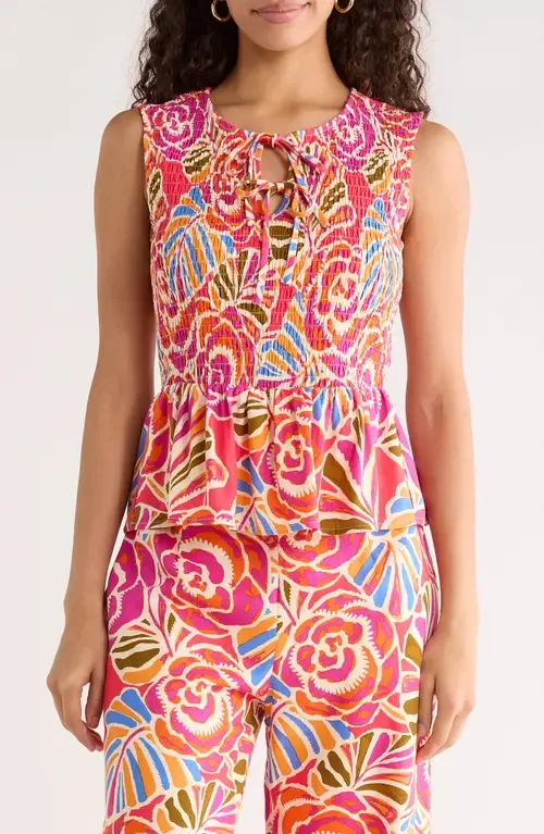 Nomi Floral Smocked Peplum Top by SUGARLIPS