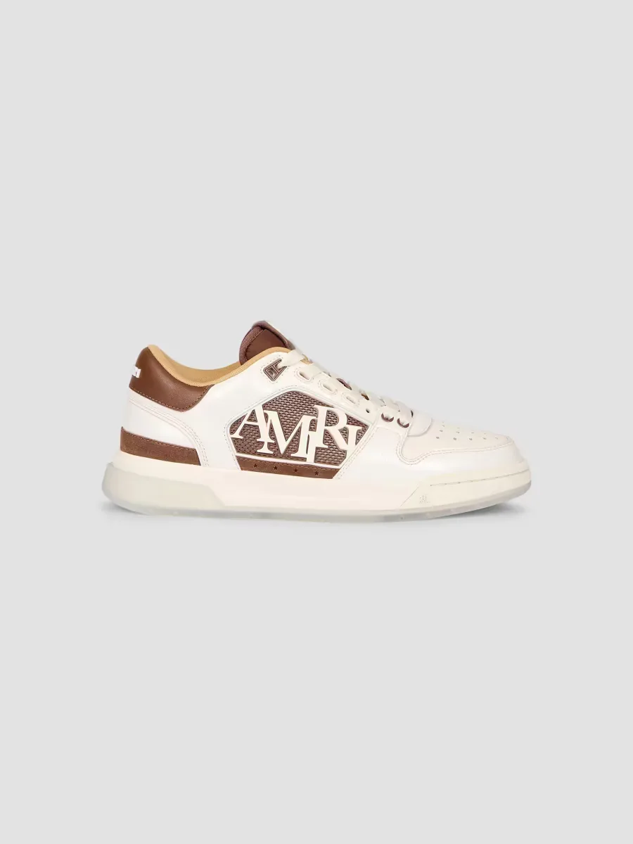 Classic Low Pebbled Leather Sneakers by AMIRI