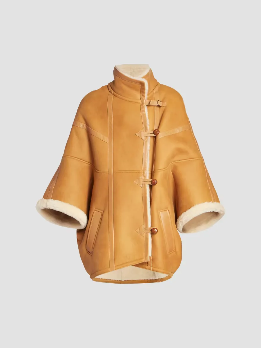 Cape in Shearling by Saint Laurent