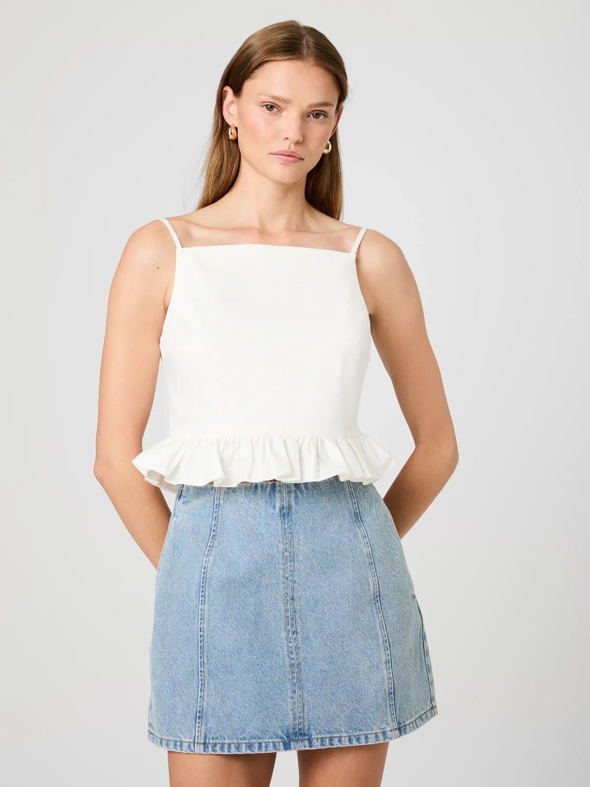 Lilah Stretch Ruffle Peplum Top by French Connection