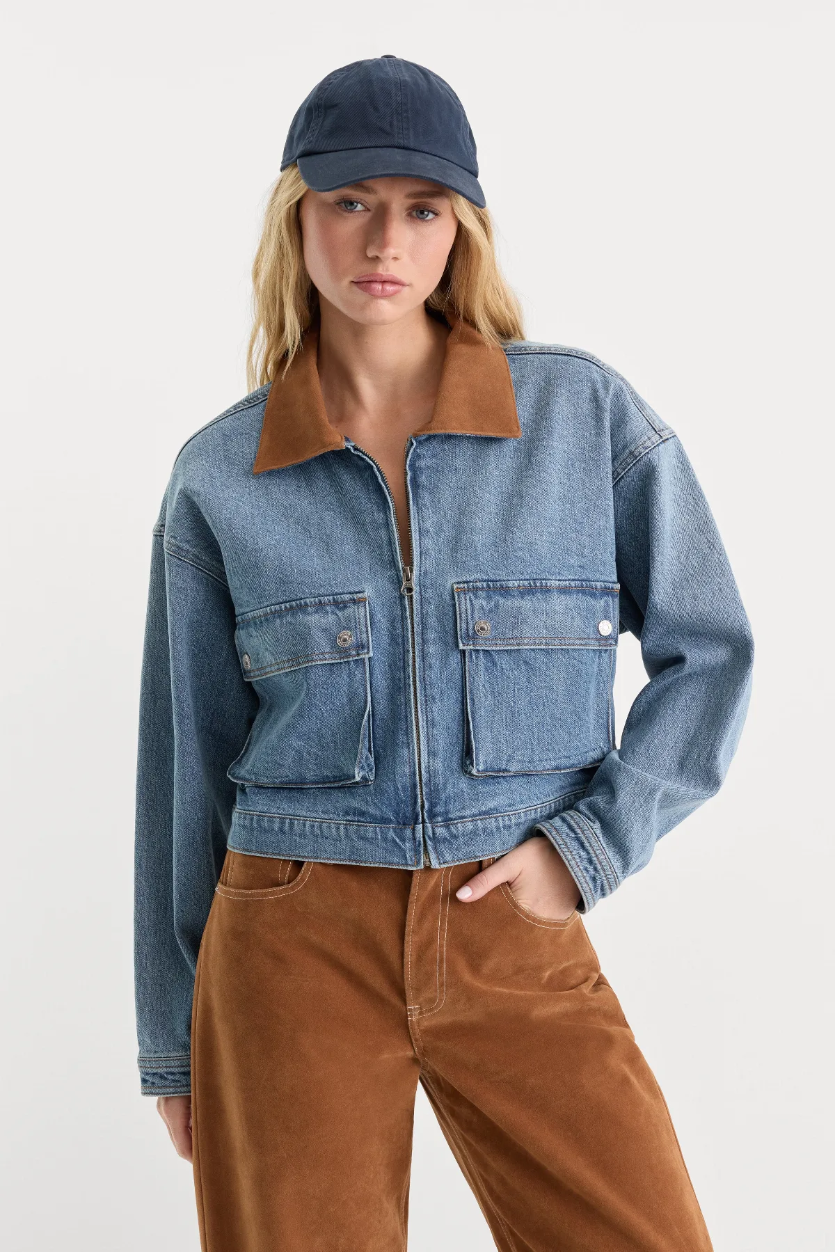 The Denim Swing Cropped Jacket by Khloé Kardashian by GOOD AMERICAN