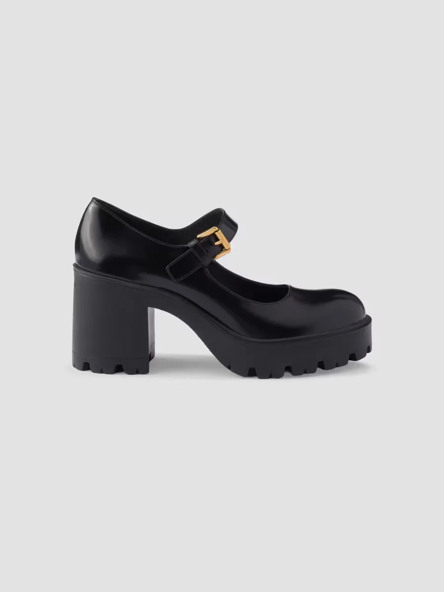 Brushed Leather Pumps by Prada