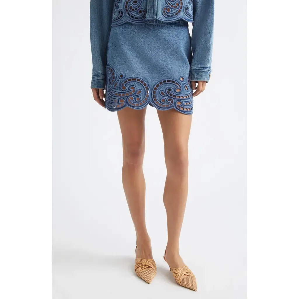 The Cadiz Eyelet Denim Miniskirt by Ulla Johnson