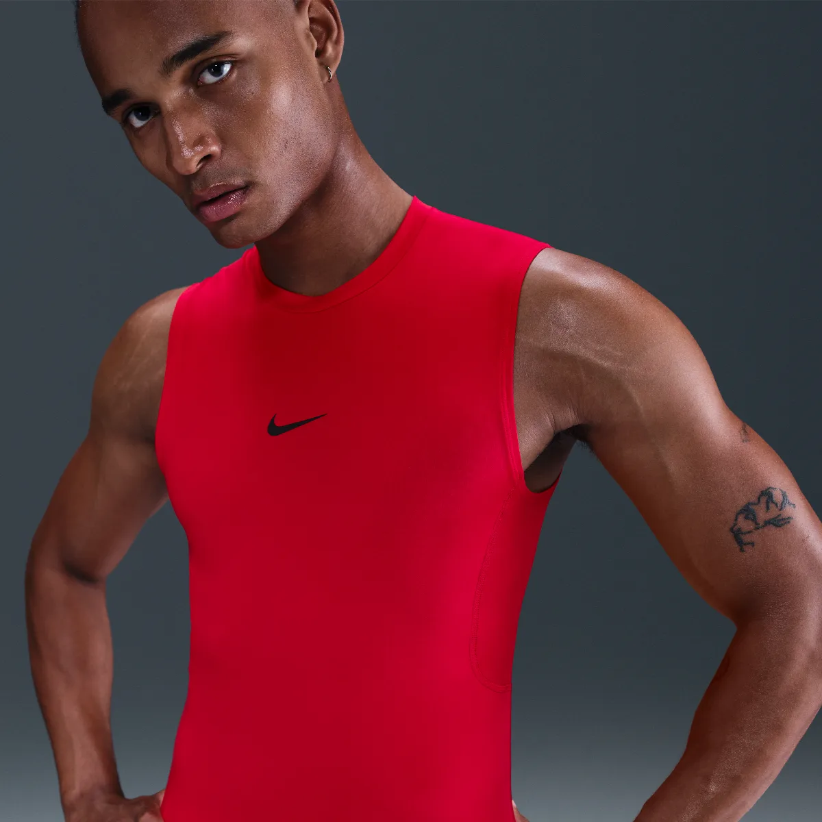 Pro Dri-FIT Tight Sleeveless Fitness Top by Nike