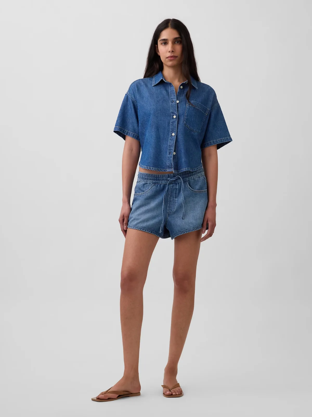 Mid Rise UltraSoft Denim Easy Dolphin Shorts by Gap
