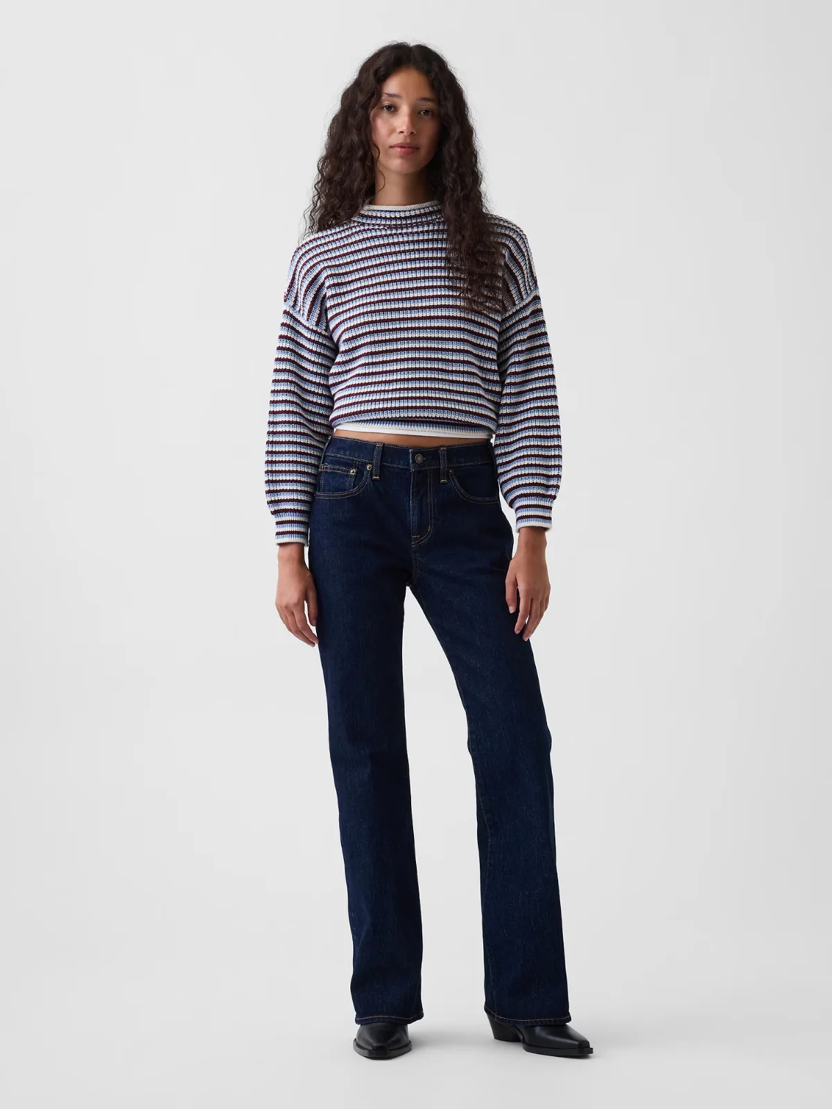 Mid Rise Relaxed Flare Jeans by Gap