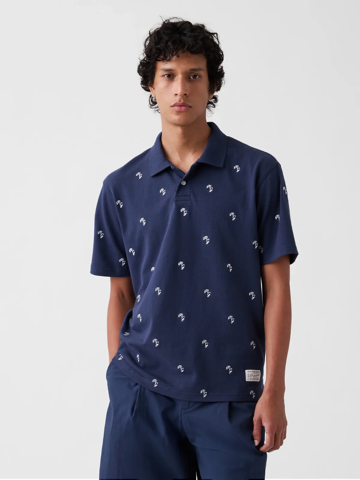 Gap x Malbon Relaxed Logo Polo Shirt by Gap
