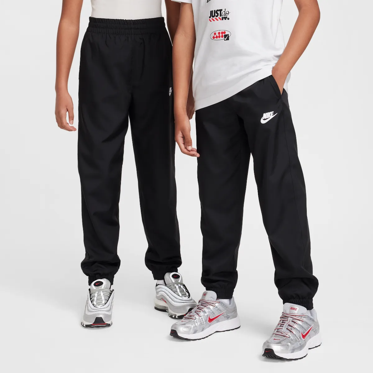 Sportswear Club Woven Jogger Pants by Nike