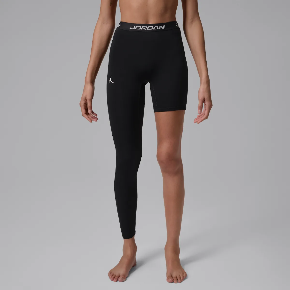 Jordan Sport High-Rise Single-Leg Basketball Tights (right) by Jordan