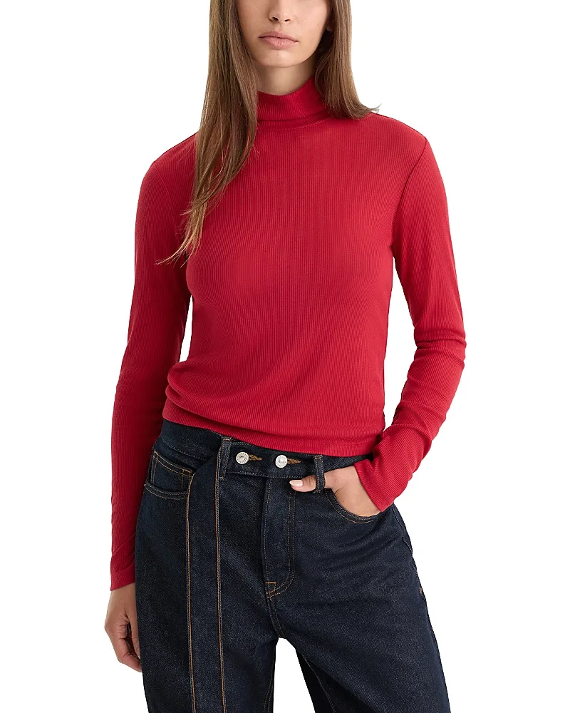 The Sheer Rib Knit Turtleneck Top by GOOD AMERICAN