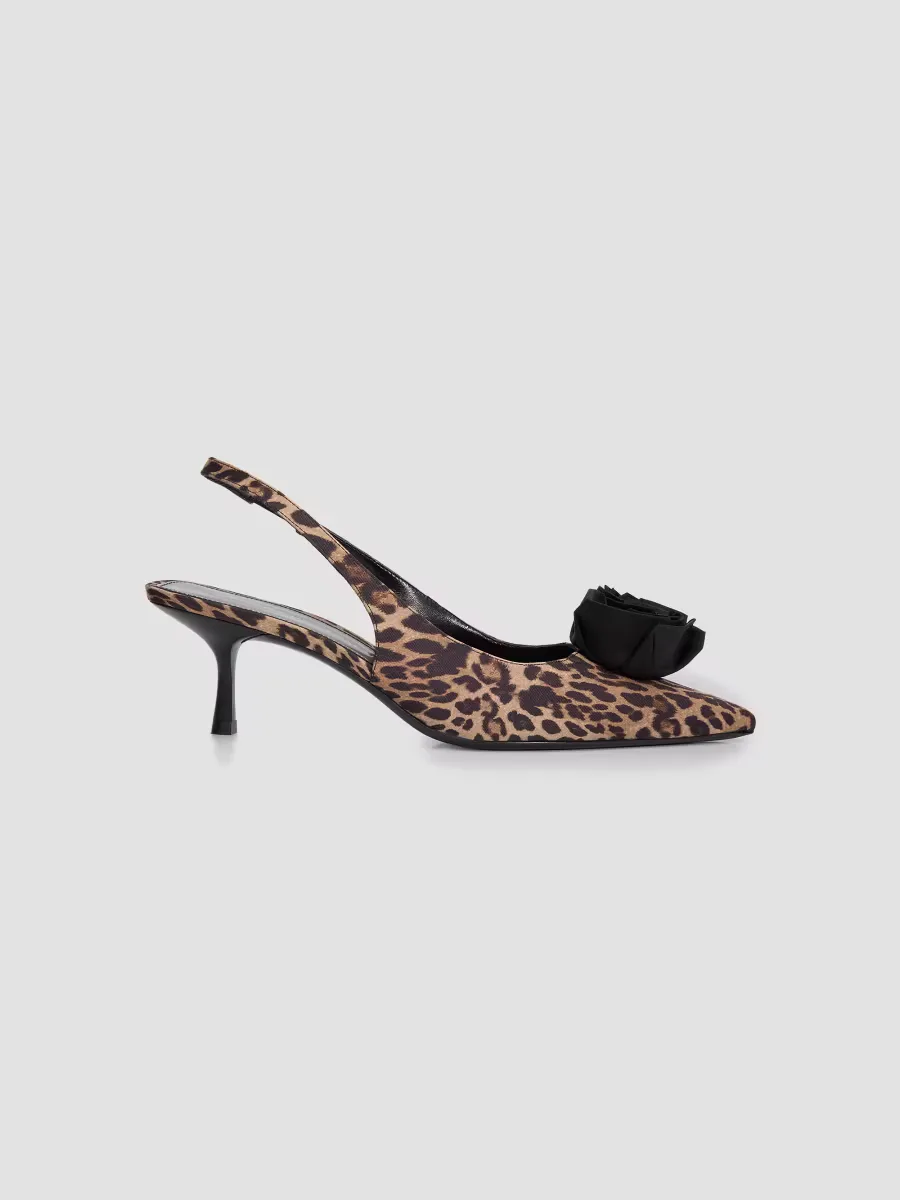 Palom 50MM Leopard-Print Calf Hair Slingback Pumps by Stuart Weitzman