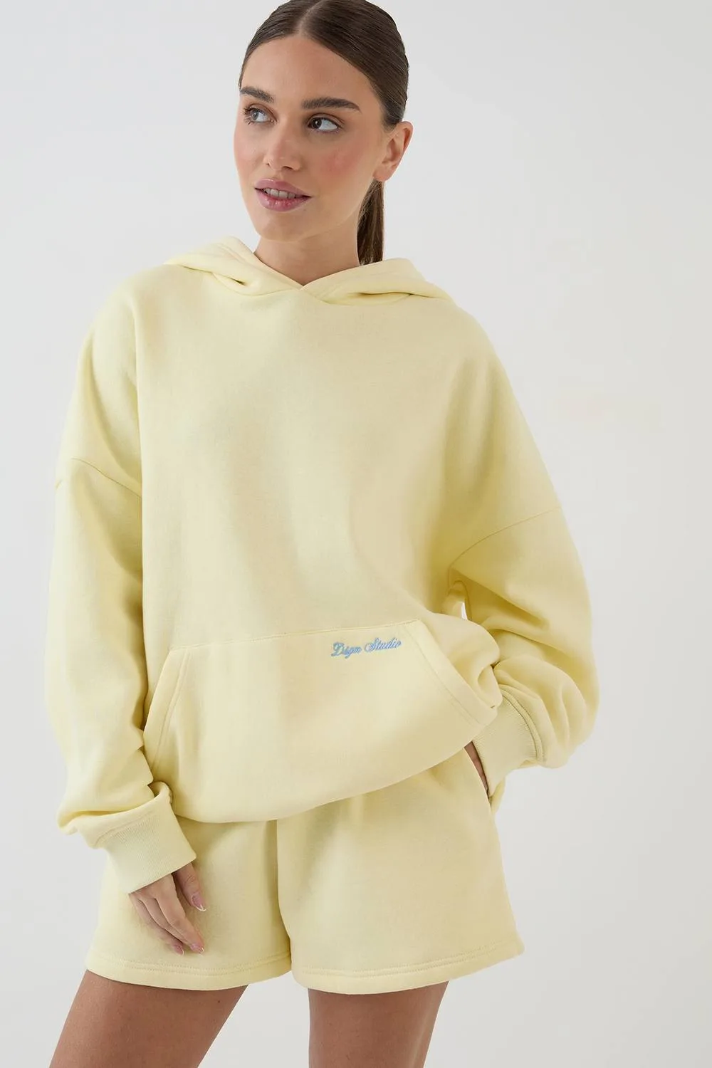 Script Embroidered Hooded Short Tracksuit by Dsgn Studio