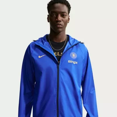 Premier League Chelsea Storm-FIT Raglan Hooded Rain Jacket by Nike