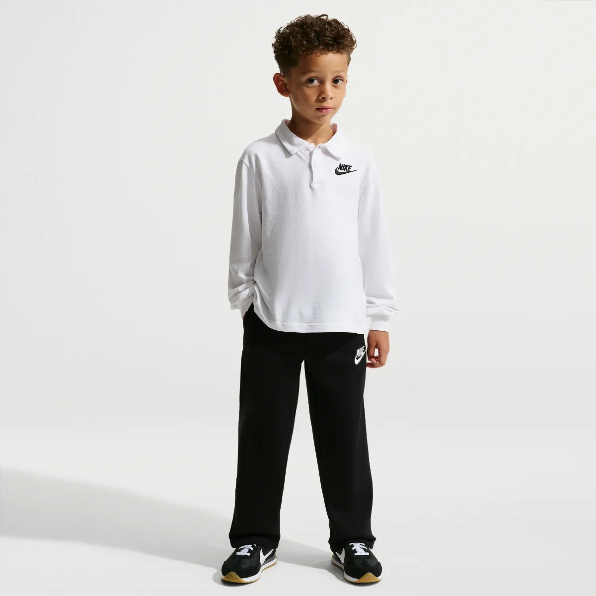 Sportswear Loose Open Hem Pants by Nike
