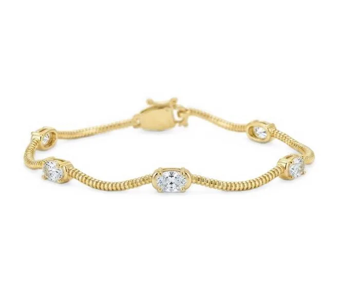 Gold-Tone Oval Cubic Zirconia Fluted Wave Bracelet, 7 by Etoielle