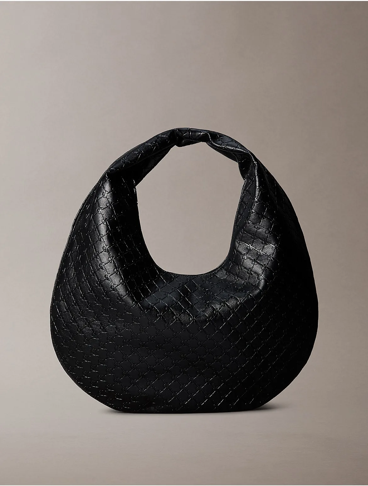 Monogram Embossed Shoulder Bag by Calvin Klein