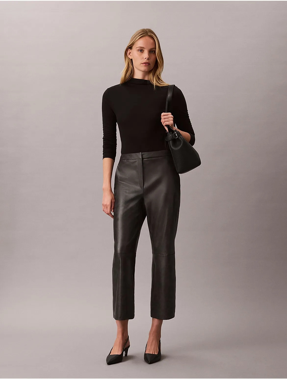 Faux Leather Flare Pants by Calvin Klein