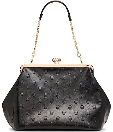 Oversize Kisslock Embossed Skull Clutch Bag by Betsey Johnson
