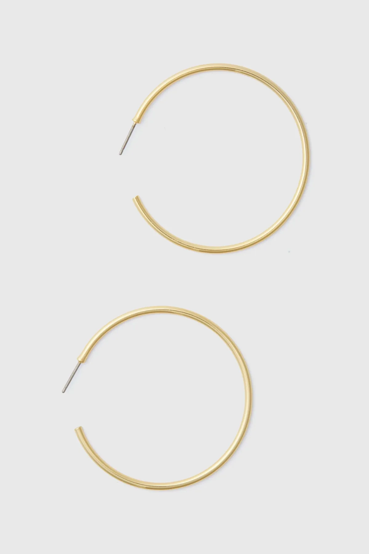 Gold Large Hoop Earrings by Tuckernuck Jewelry