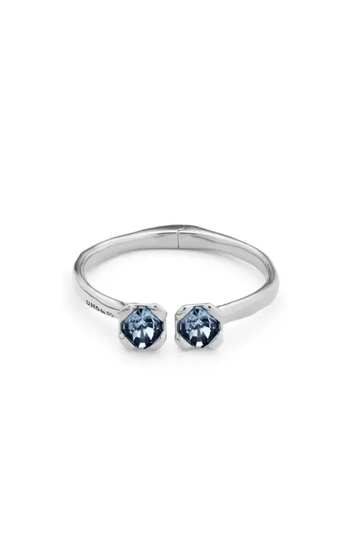 Sterling Silver-Plated Bangle Bracelet with Inner Spring and Two Blue Crystals by UNODE50