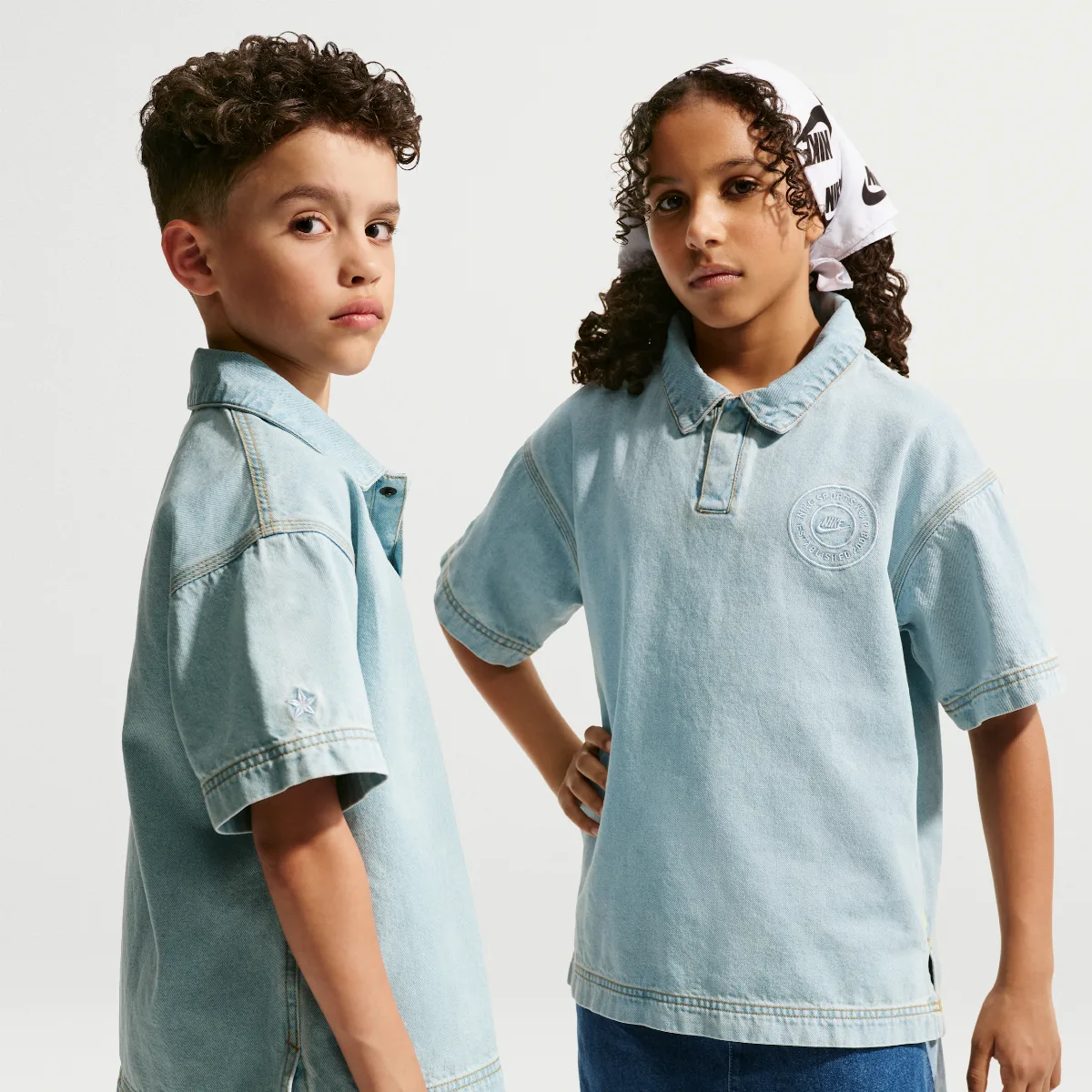 Sportswear Collection Denim Short-Sleeve Polo by Nike