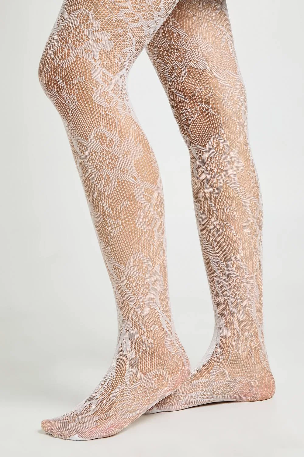 Scattered Floral Fishnet Tights by boohoo
