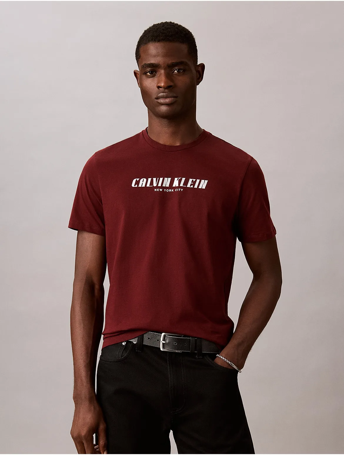Slanted Calvin Logo Graphic Tee by Calvin Klein