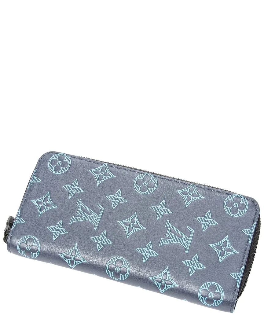 Zippy Vertical Leather Wallet by Louis Vuitton