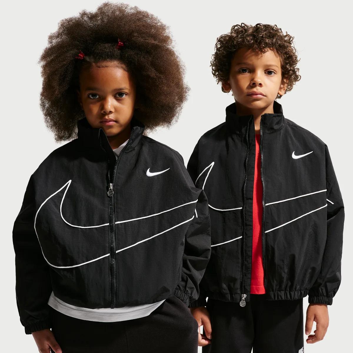 Big Swoosh Hoodless Wind Jacket by Nike