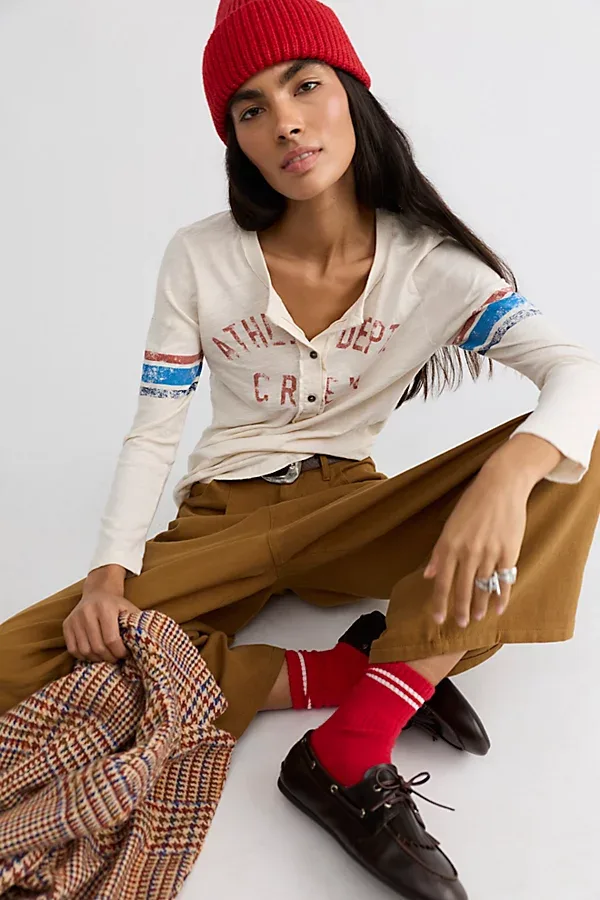 With the Team Henley Long Sleeve Tee by Ragabond