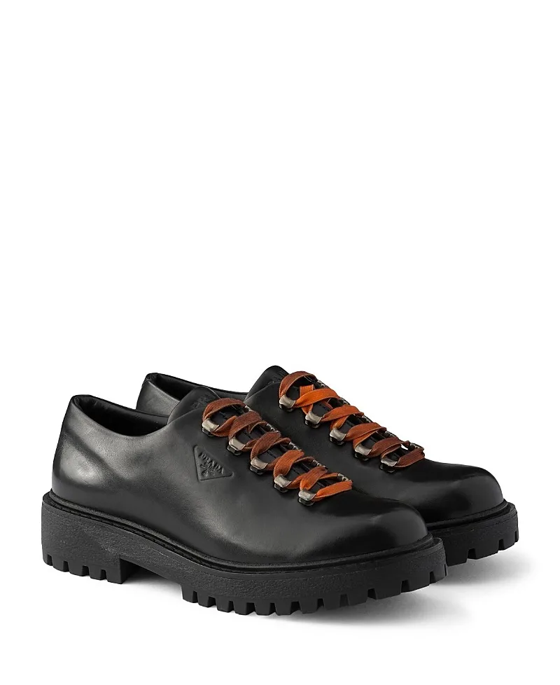 Aged Leather Lace-Up Shoes by Prada