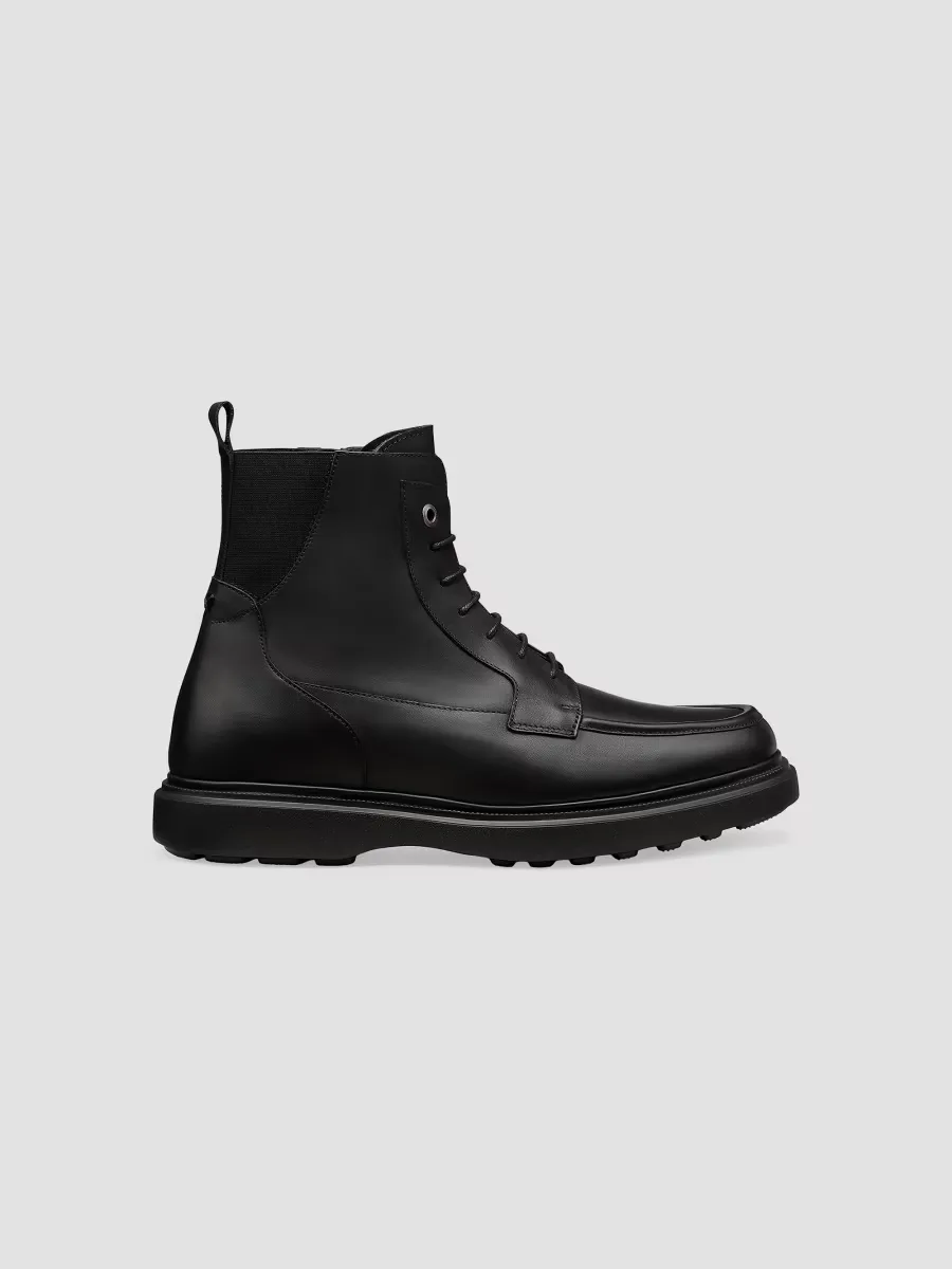Cooper Leather Combat Boots by Stuart Weitzman