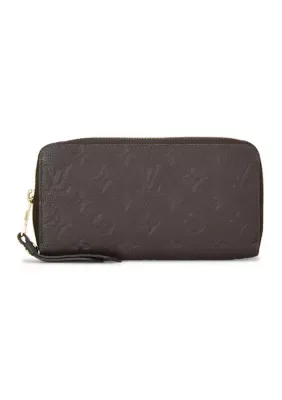 Louis Vuitton Zippy Wallet by What Goes Around Comes Around