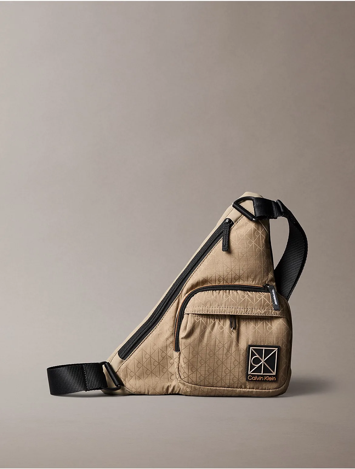 Allover Emblem Logo Utility Sling Bag by Calvin Klein