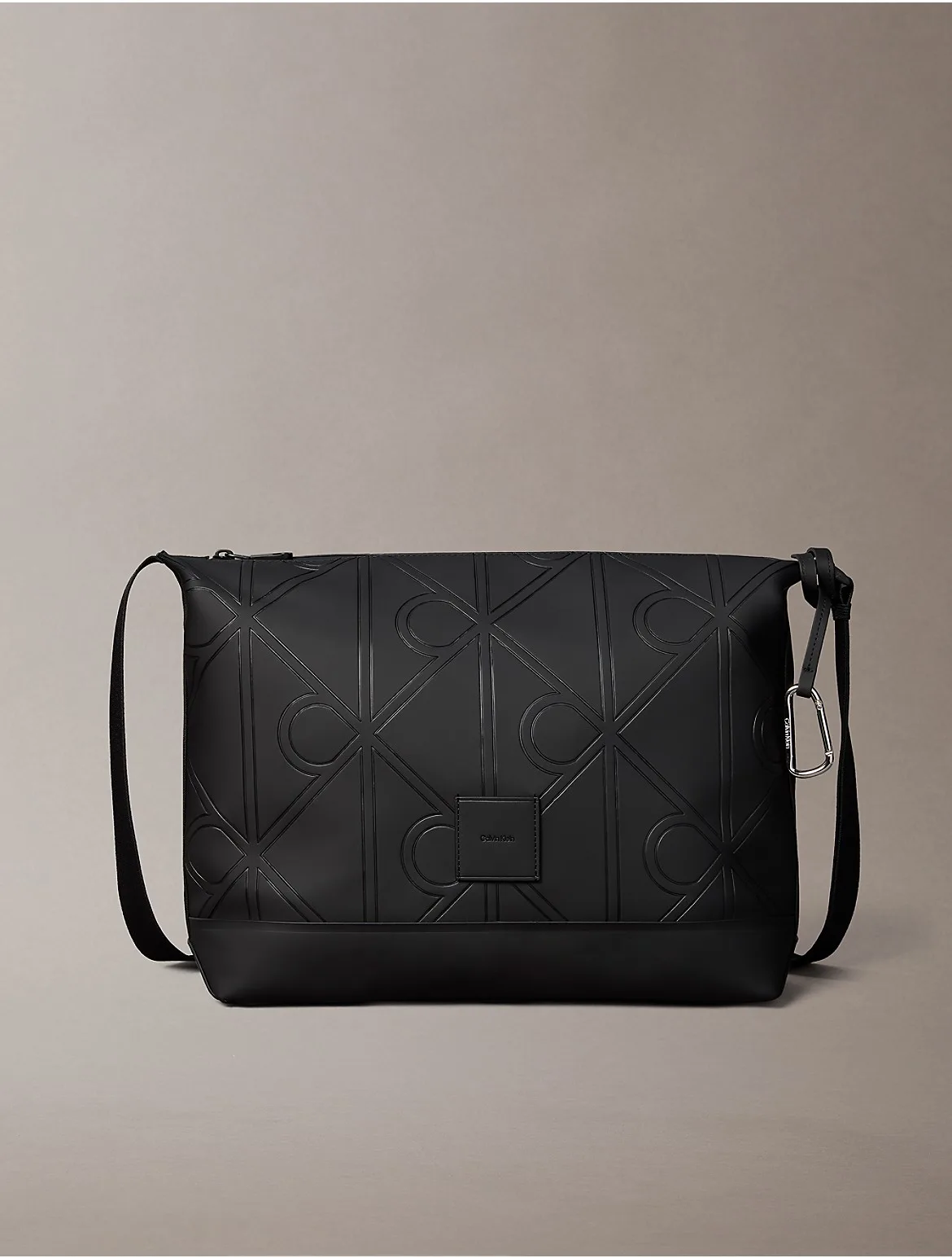 Emblem Logo Rubberized Messenger Bag by Calvin Klein