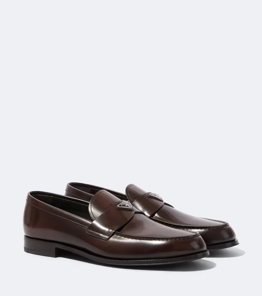 Logo Leather Loafers by Prada