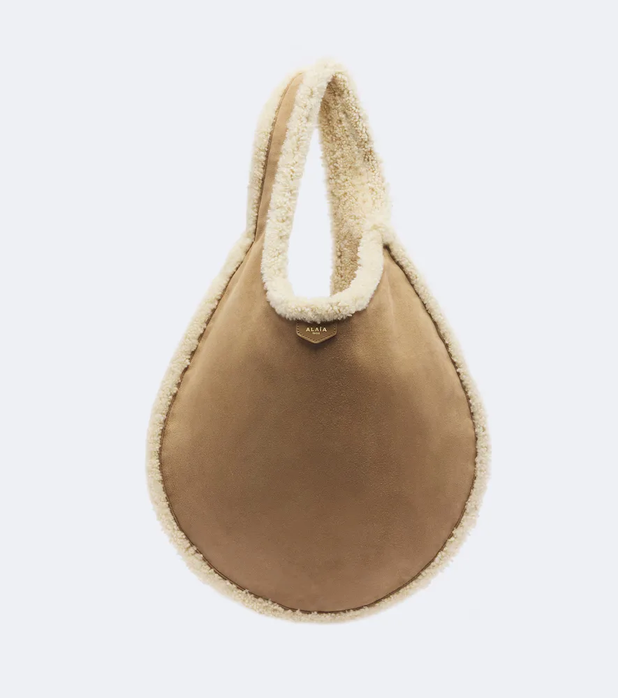One Piece Shearling-Lined Suede Shoulder Bag by Alaia