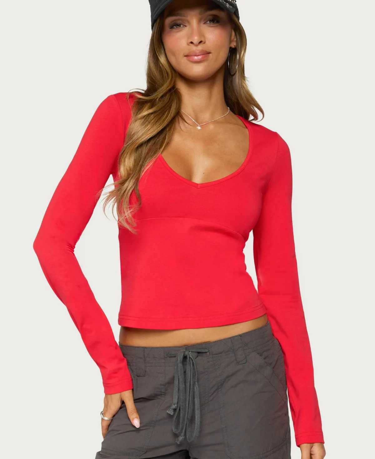 Feva Long-Sleeve V-Neck Crop T-Shirt by Edikted