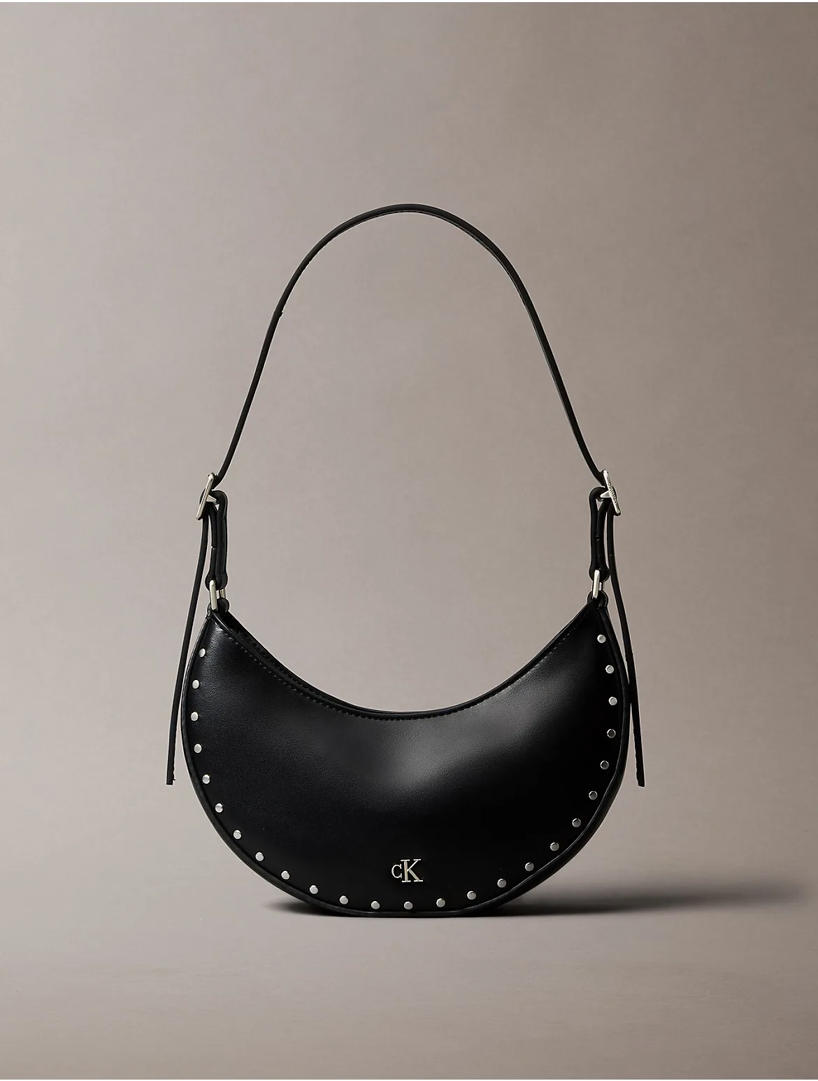 Hardware Monogram Studded Crescent Shoulder Bag by Calvin Klein
