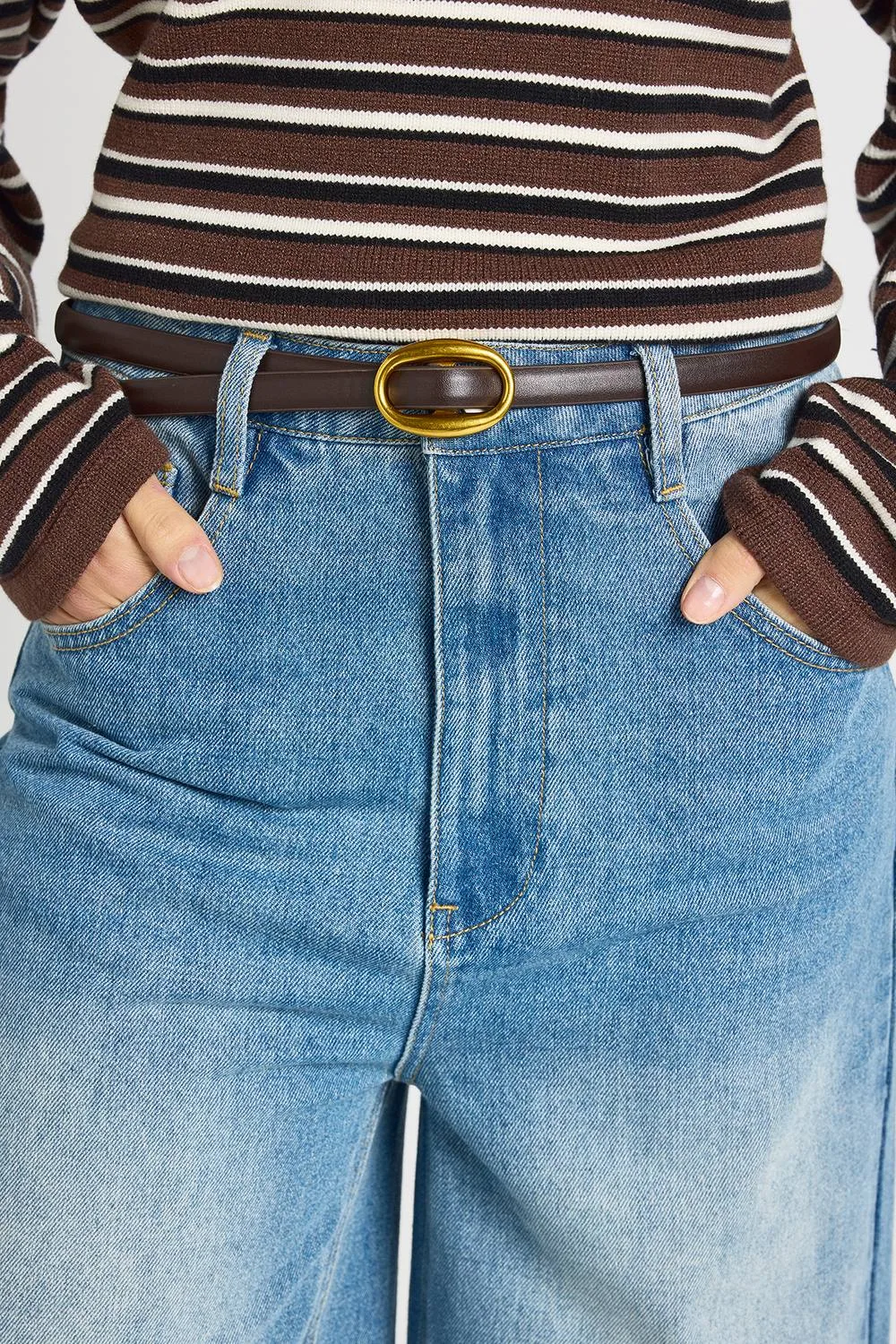 Round Buckle Padded Skinny Belt by boohoo