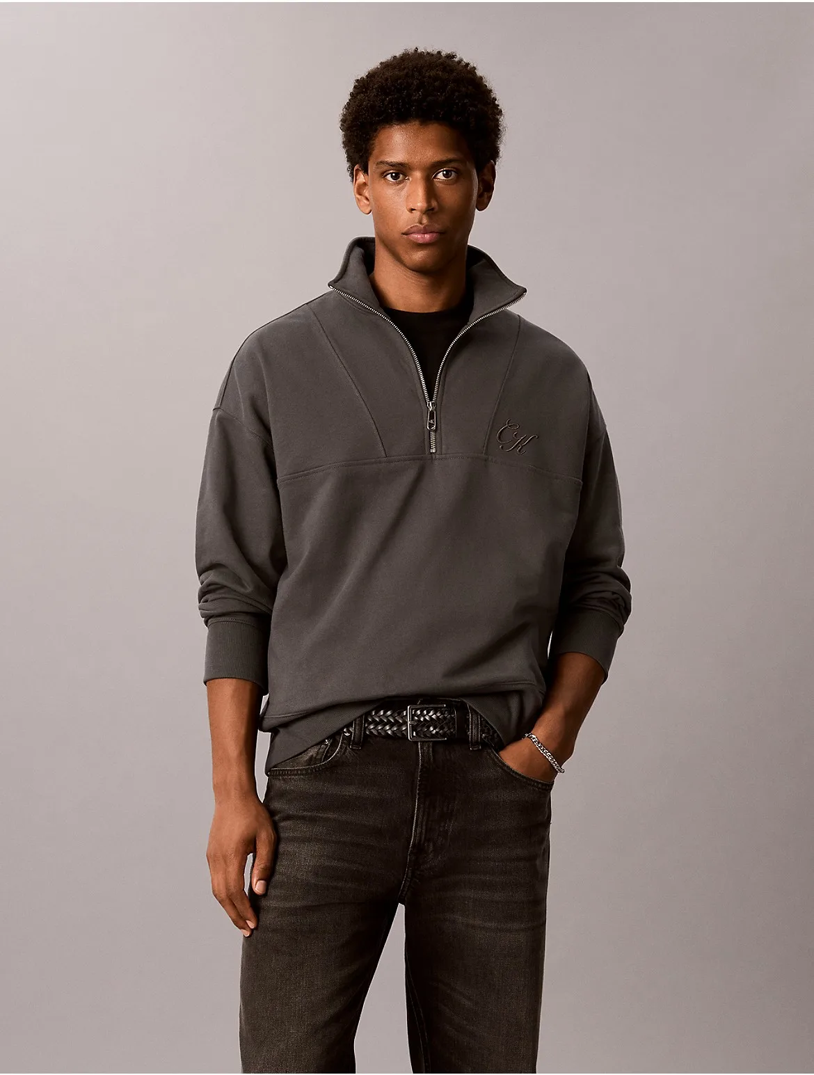 Script Logo Graphic Relaxed Quarter Zip Sweatshirt by Calvin Klein