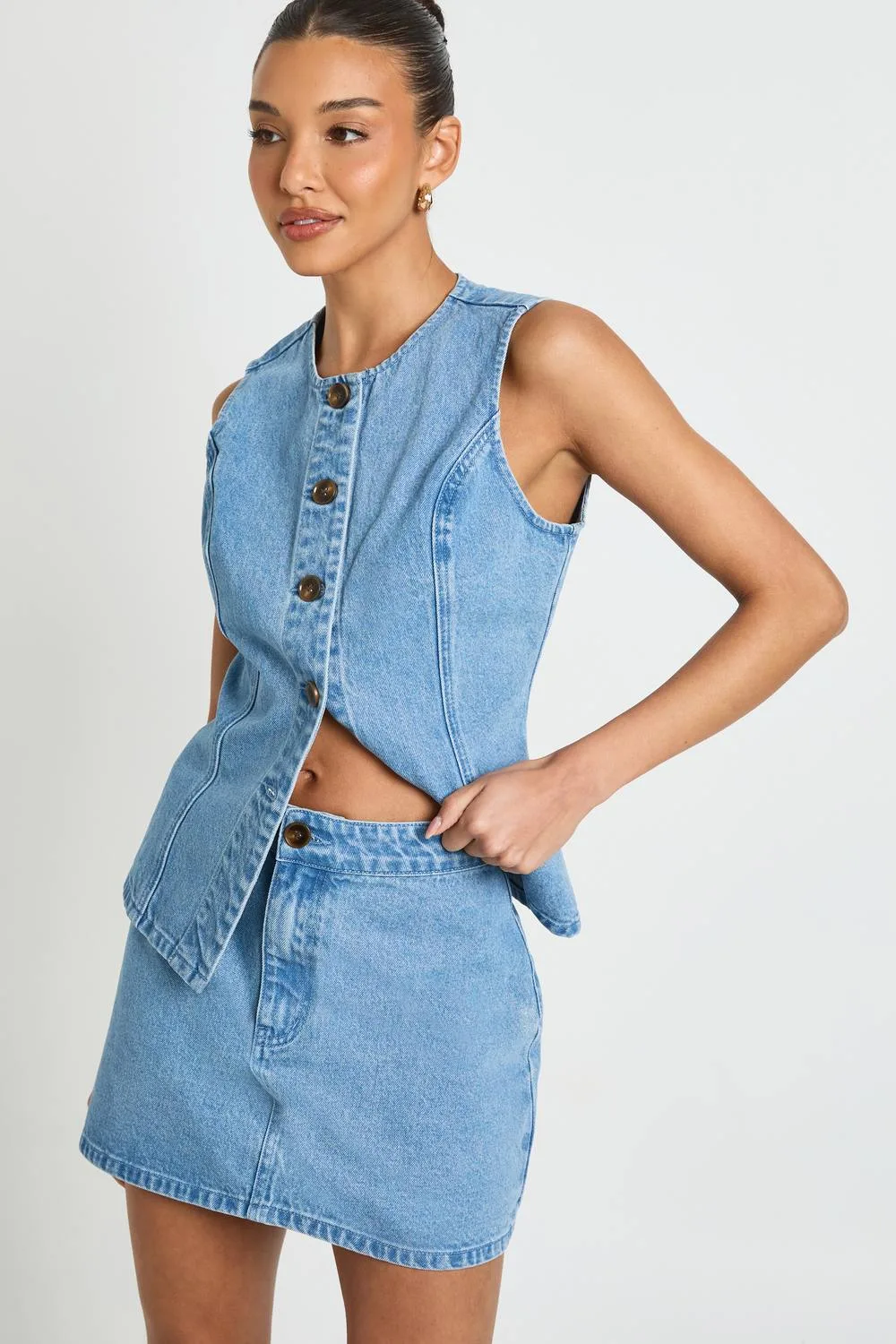 Denim Mini Skirt in Mid Wash by boohoo