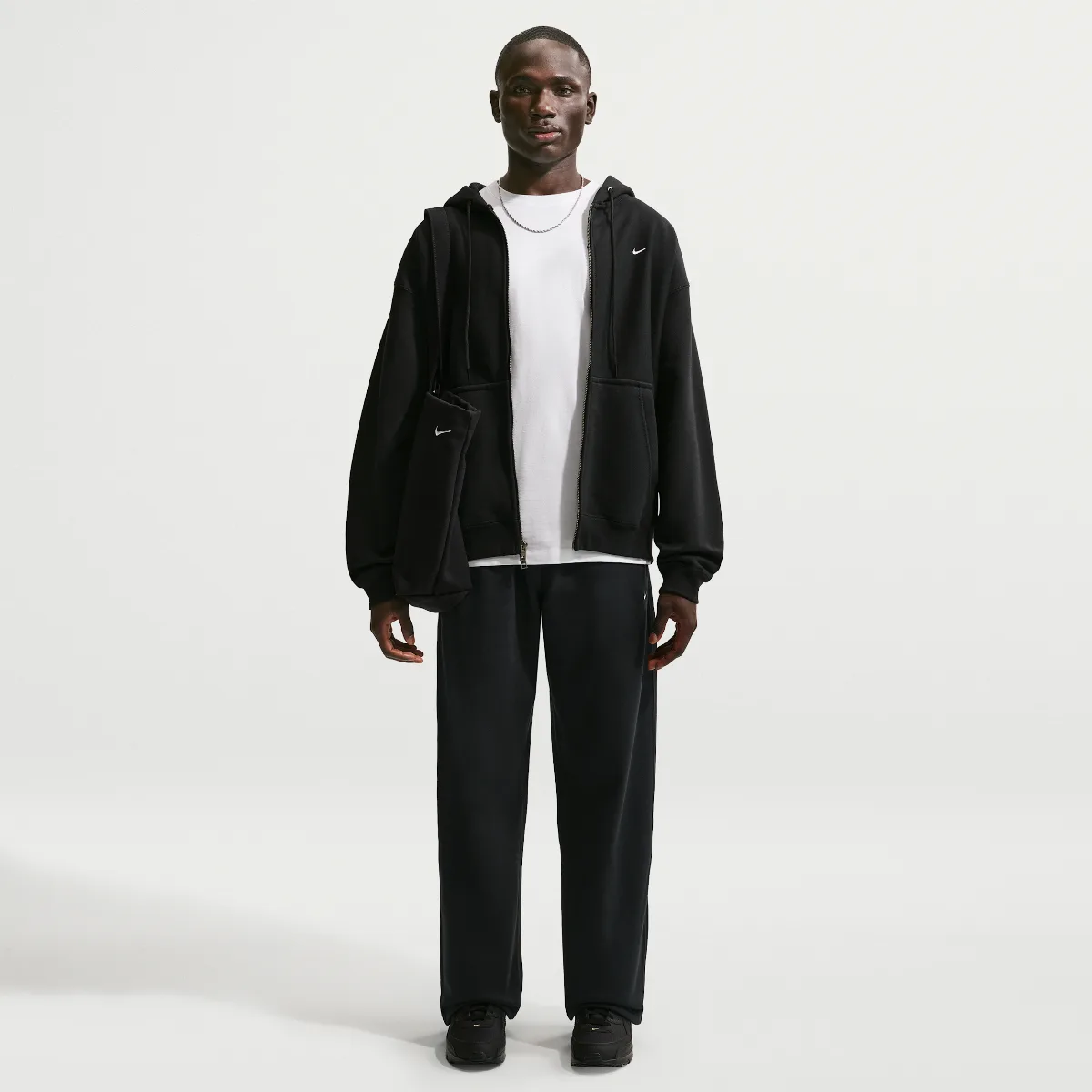 Solo Swoosh Fleece Open-Hem Pants by Nike