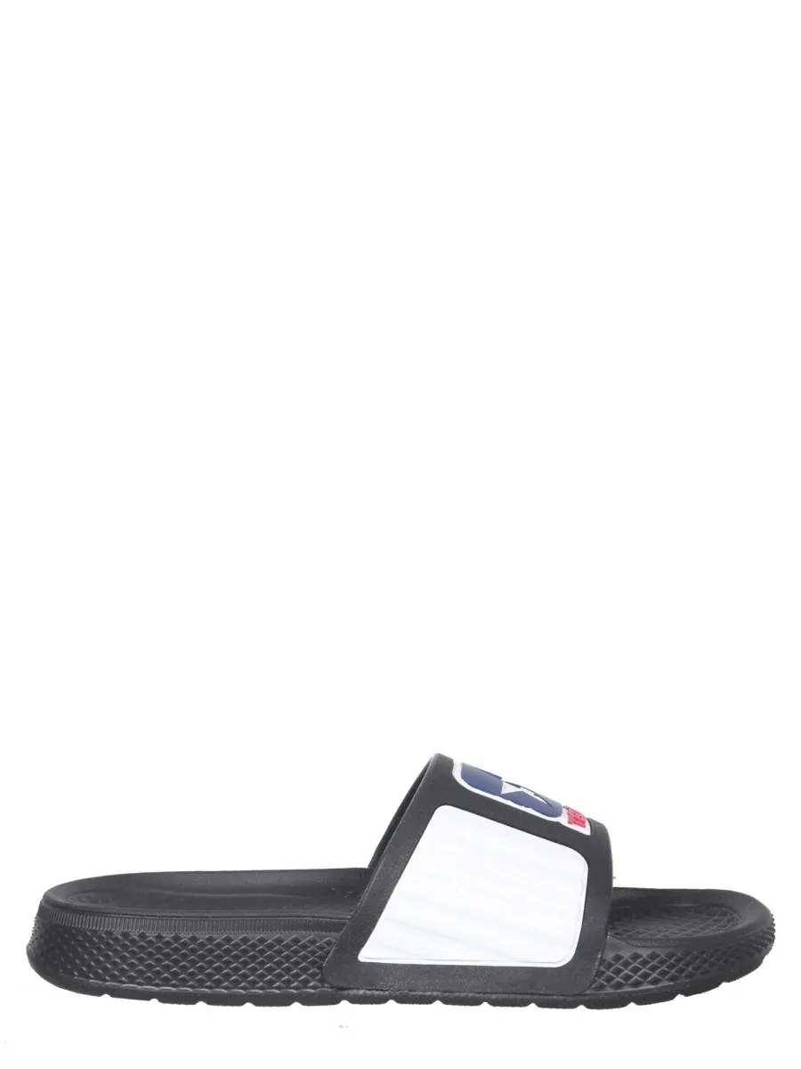 Rubber Slide Sandals by Telfar